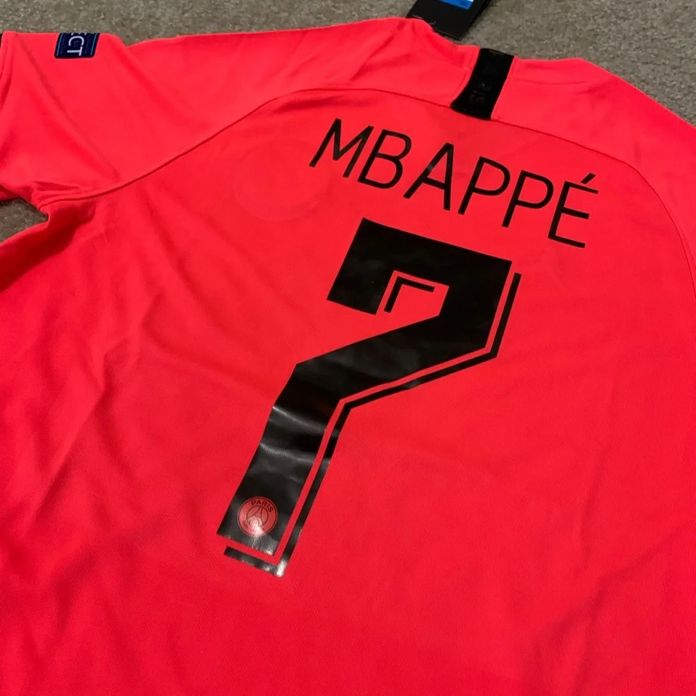 Jordan Men’s Mbappé #7 Short Sleeve Jersey - Neon Coral with Black Accents